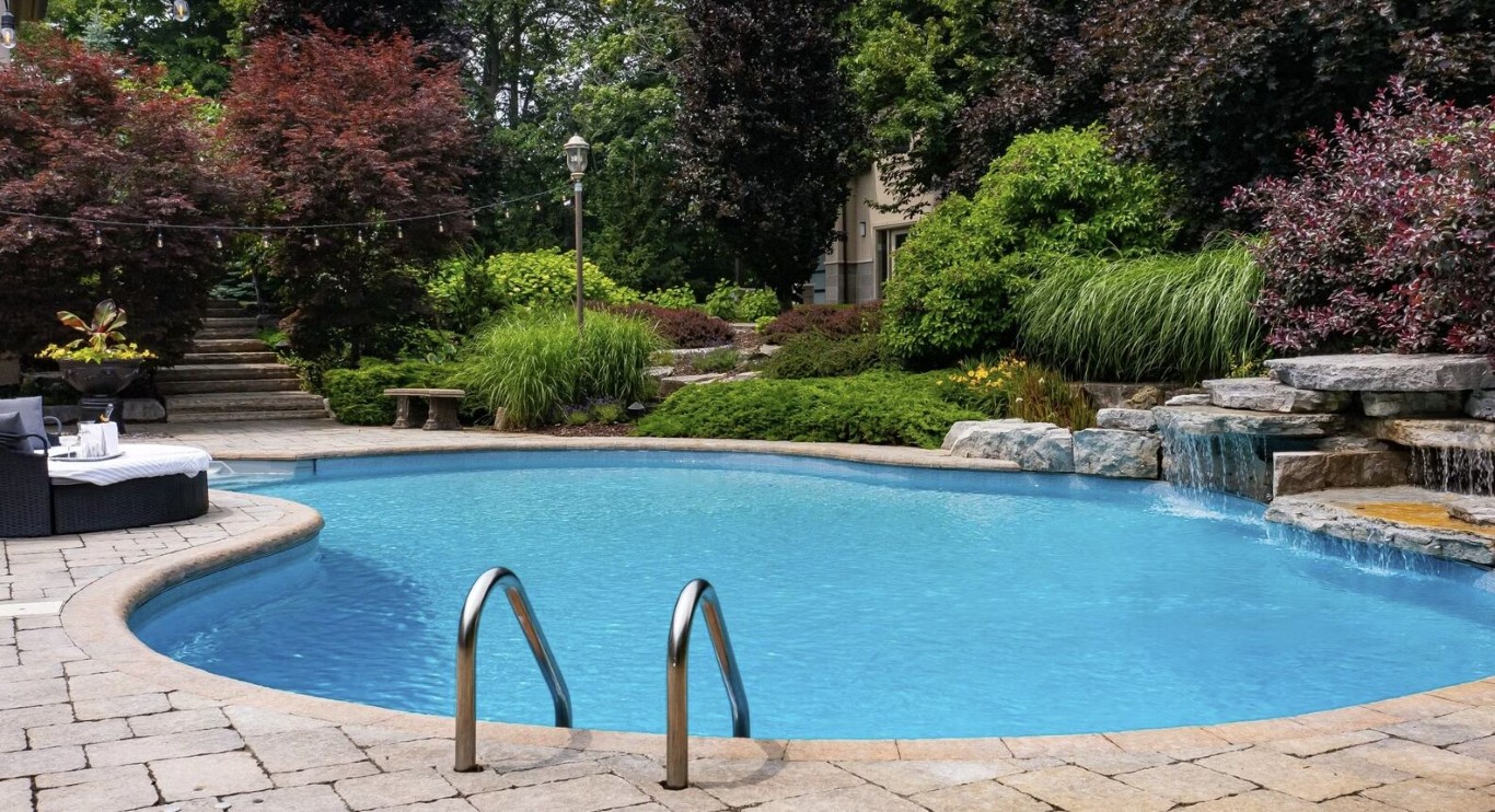 Deep cleaned pool with natural stone waterfall features